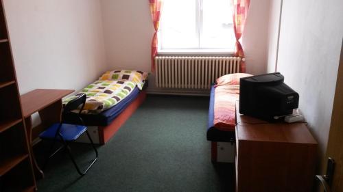 Postel nebo postele na pokoji v ubytování Hostel Karin