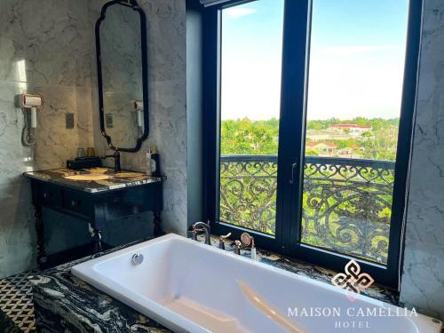 Vannituba majutusasutuses MAISON CAMELLIA Hotel