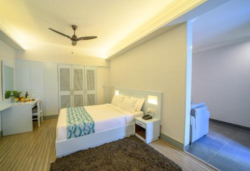 Cama o camas de una habitación en Sinclairs Siliguri