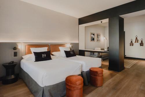 Posteľ alebo postele v izbe v ubytovaní Hotel Dimar