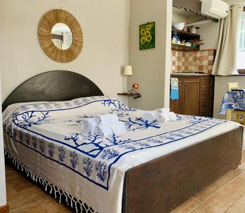 A bed or beds in a room at Il Calesse - Noto