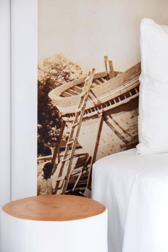Una cama o camas en una habitación de Kaerati Apartments