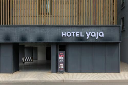 a hotel yahoo sign on the side of a building at Hotel Yaja Siheung Jeongwang in Siheung