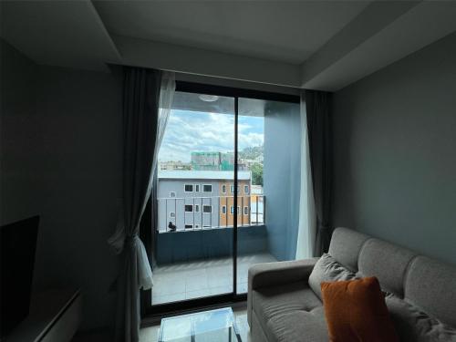 Χώρος καθιστικού στο Condo Surin-Bangtao Beach