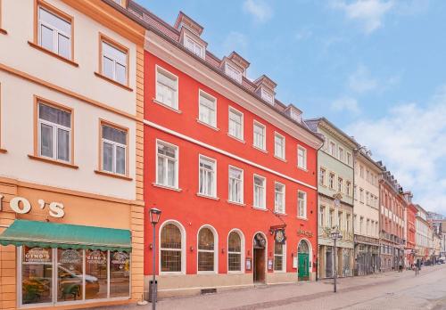 a row of buildings on a city street at HIP Hotel in Heidelberg