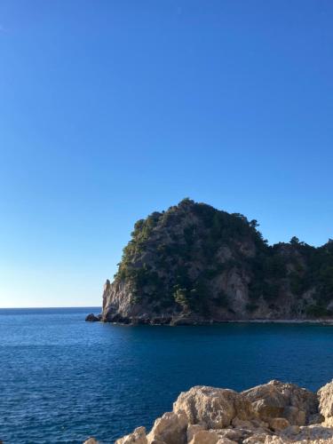 a small island in the middle of the ocean at Kokkini Peach Budget in Kokkínion