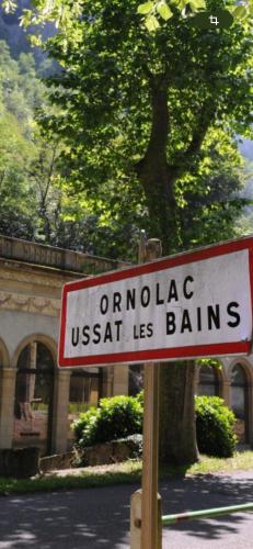 a sign that reads orlando us at its balls at Chez Mimi in Ornolac-Ussat-les-Bains