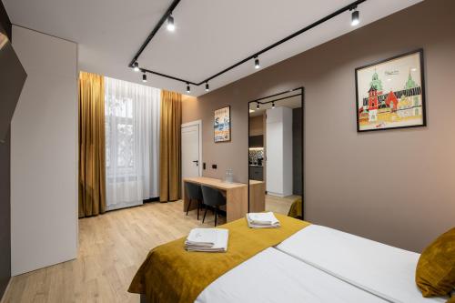 Postel nebo postele na pokoji v ubytování Platinia Premium Apartments