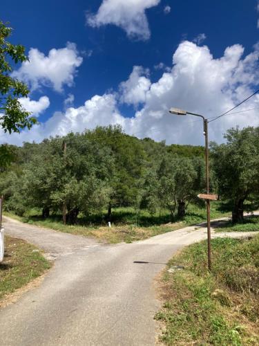 a street light on the side of a road at Kokkini Peach Budget in Kokkínion