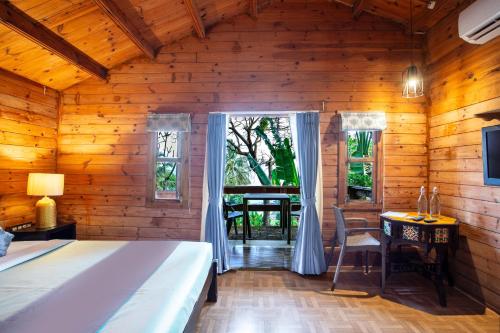 Postel nebo postele na pokoji v ubytování Stone Water Eco Resort