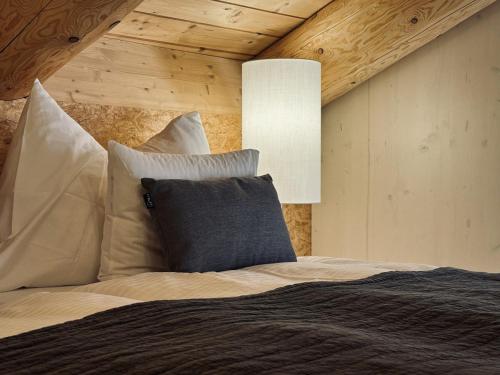Postel nebo postele na pokoji v ubytování Standard 4 - Heiti Lodge