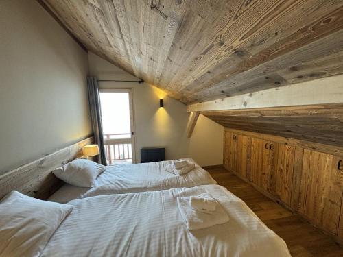 Ένα ή περισσότερα κρεβάτια σε δωμάτιο στο Chalet Schuss