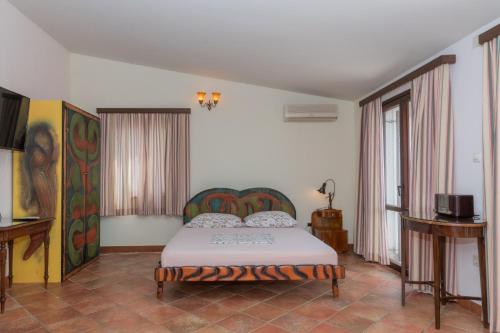 a bedroom with a bed in a room at Apartments Magic Time in Podstrana