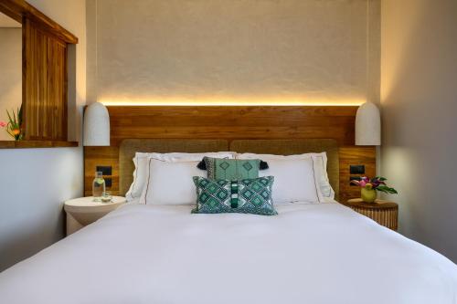 Ένα ή περισσότερα κρεβάτια σε δωμάτιο στο Hotel Canaan - Fattal Limited Edition
