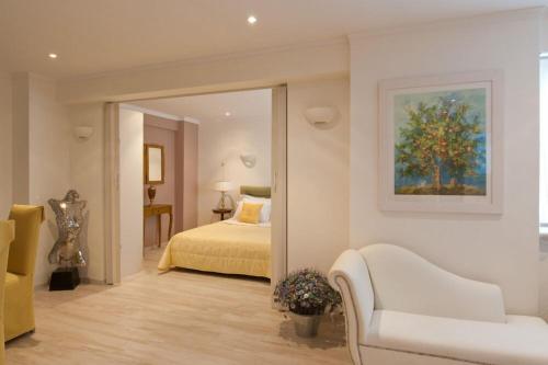 Ένα ή περισσότερα κρεβάτια σε δωμάτιο στο Acropolis Luxury Apartment