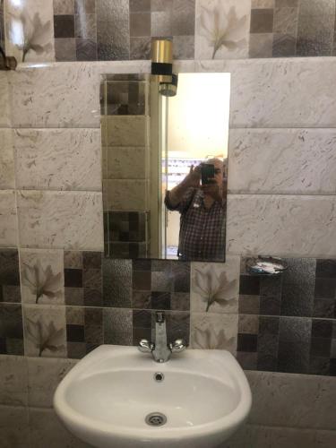 Ένα μπάνιο στο Saint Rita Guest House Alex