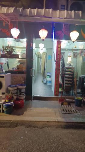 an entrance to a store with the door open at Health Homestay KL in Kuala Lumpur