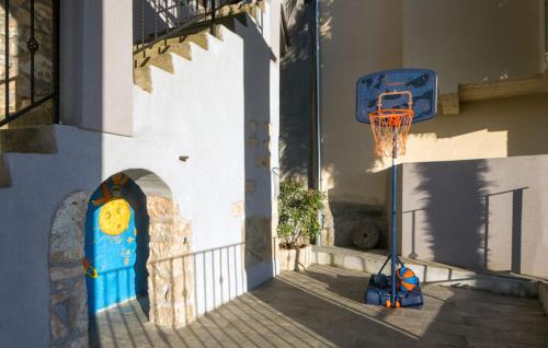 a basketball hoop on the side of a building at Beautiful Villa Palazzo Adriana Krk in Dobrinj