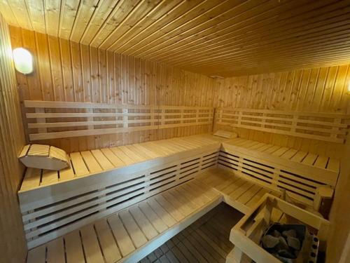 a inside of a sauna with wooden walls at Naturhotel Wieserhof in Longostagno