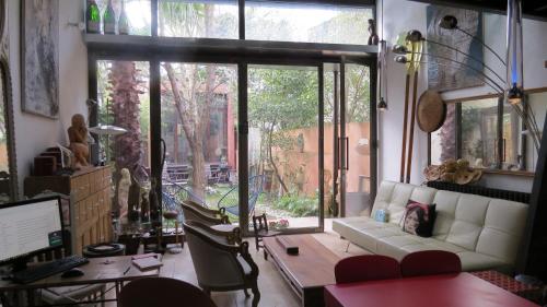 Maison colorée, jardin et studio