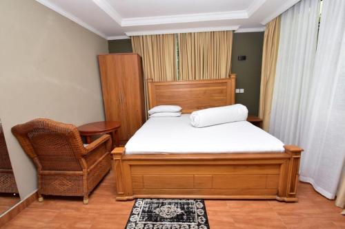 Lova arba lovos apgyvendinimo įstaigoje Acres Hotels