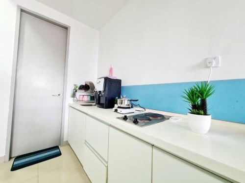 Η κουζίνα ή μικρή κουζίνα στο First Subang Subang Nu Empire Subang Parade Taylors SJMC Sunway Pyramid Lagoon Sunway Medical Center