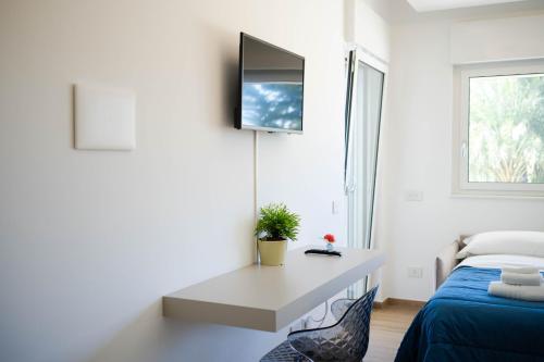 Ένα ή περισσότερα κρεβάτια σε δωμάτιο στο Villa Erada