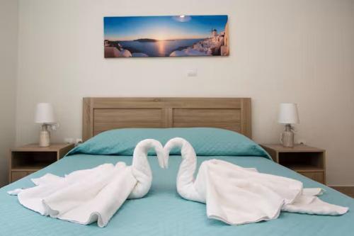 Ένα ή περισσότερα κρεβάτια σε δωμάτιο στο CYNTHIA Apartment 1