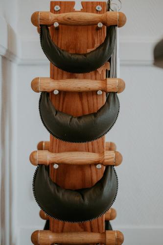 a spiral of wood and black at Brit Hotel Le Parc Vichy in Bellerive-sur-Allier
