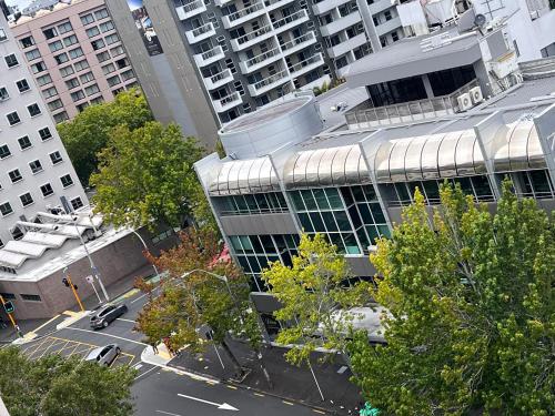 an overhead view of a building with a lot of trees at Aura two bedroom1 living room Wifi ,balcony, harbor view, easy parking 1404 in Auckland