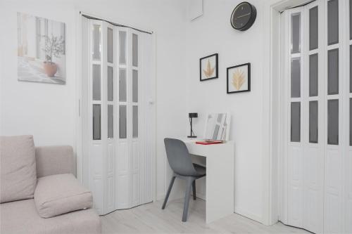 Ruang duduk di Jasny Apartament z Tarasem i Parkingiem by Noclegi Renters