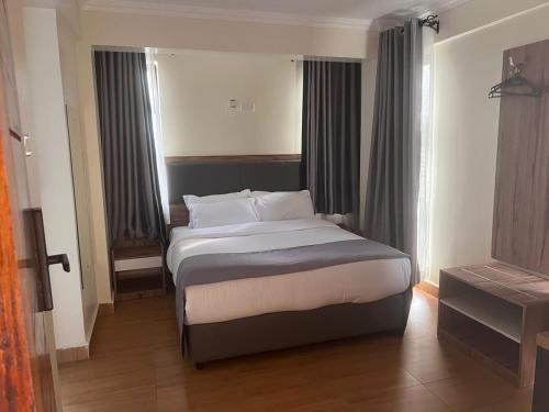 Ένα ή περισσότερα κρεβάτια σε δωμάτιο στο Canopy View Hotel