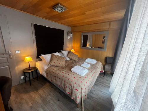 Postel nebo postele na pokoji v ubytování Résidence LA POUDREUSE - Hyper centre - Apt 3 Pièces 75 M2 - by MONTBLANC LODGE
