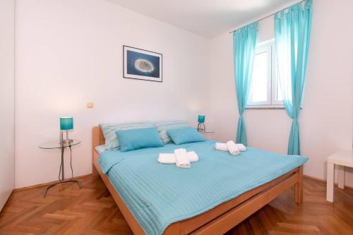Postel nebo postele na pokoji v ubytování Apartment Lavendel - P. Dorcica