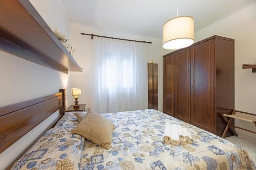 Letto o letti in una camera di Casa Anna a Pomonte - Goelba