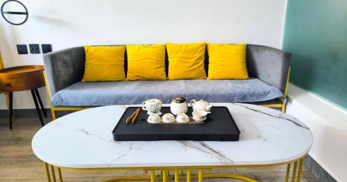 a living room with a couch and a table at Prajna Pavilion in Dali Ancient Town