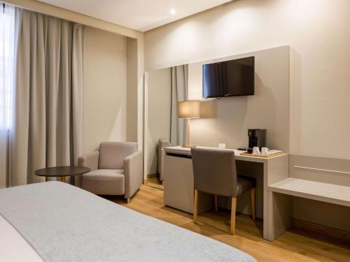 Postel nebo postele na pokoji v ubytování Mercure Carlton Rioja