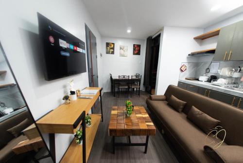 Η κουζίνα ή μικρή κουζίνα στο CJ Apartments