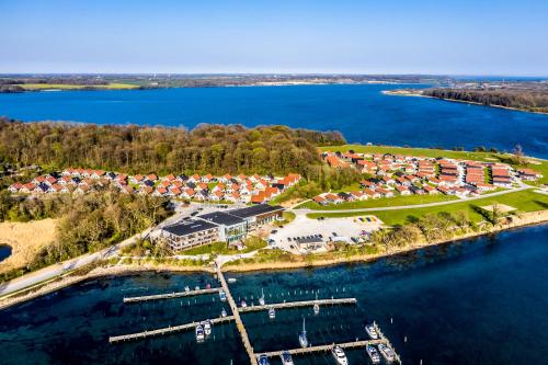 an aerial view of a resort next to a body of water at Enjoy Resorts Marina Fiskenæs - Wellness & Waterpark in Gråsten