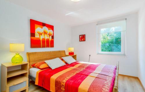 Ένα ή περισσότερα κρεβάτια σε δωμάτιο στο Beautiful Casa Forest Mare in Crikvenica