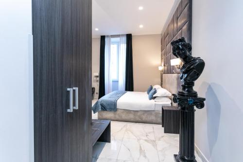 Cesare ai Cavalieri Suitesにあるベッド