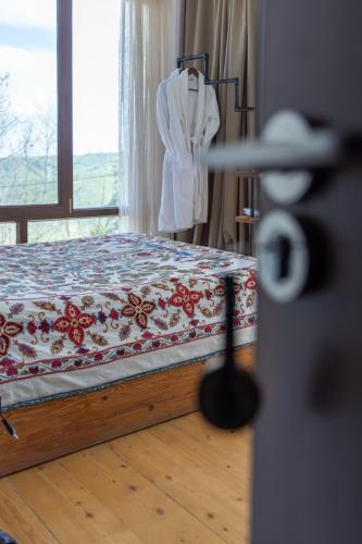 Postel nebo postele na pokoji v ubytování Lost Ridge Inn, Brewery & Ranch