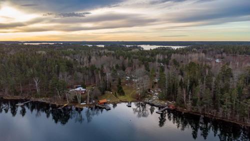an aerial view of a house on a island in the water at Hus Skärgården in Figeholm