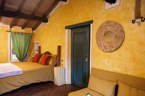 Postel nebo postele na pokoji v ubytování B&B il Fornello a Padernello