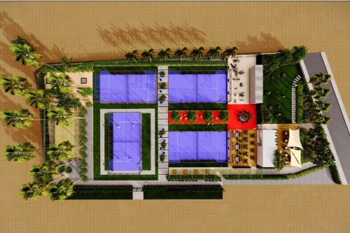 a model of a building with flowers and plants at The HEALTHY Stay-Padel, Pool&Fitness in Ayia Napa