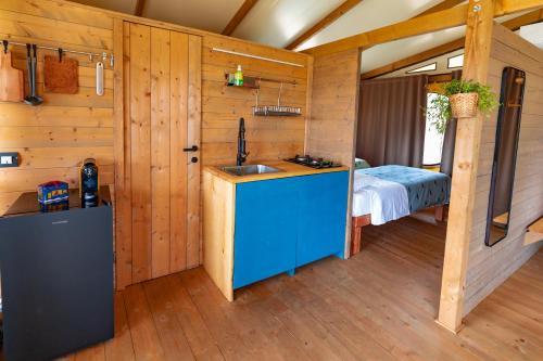 Eldhús eða eldhúskrókur á Glamping Stregaia