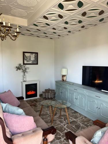 TV a/nebo společenská místnost v ubytování CASA LUMERMA