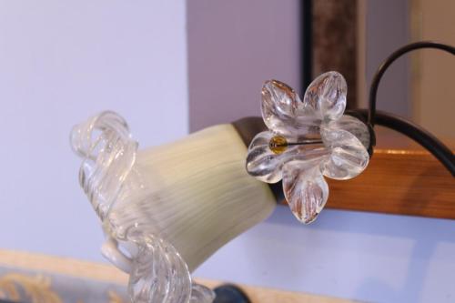 a glass flower is attached to a light fixture at Hotel Belle Epoque in Sanremo