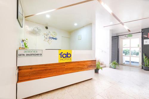 Un certificado, premio, letrero u otro documento en FabHotel Cosmo Annora - Nr Domlur
