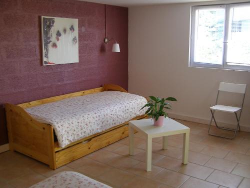 Katil atau katil-katil dalam bilik di Le Bord de l'eau